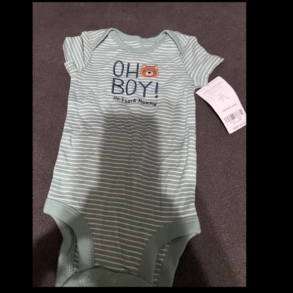 Baby clothes all brand new from carters with tags still on...